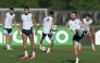 Argentina’s Lionel Messi (right) takes part in a training session with teammates. (AFP)