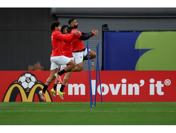 Egypt's Mohamed Salah (right) takes part in a training session with teammates.