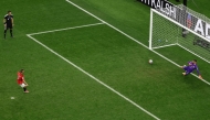 Egypt's defender #05 Ramy Rabia (L) shoots and scores in a penalty shoot-out during the 2026 World Cup round of 32 football match between Australia and Egypt at the Dallas Stadium in Arlington. (Photo by Aric Becker / AFP)