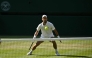 Serbia's Novak Djokovic prepares to return to France's Arthur Rinderknech during their men's singles third round tennis match on the fifth day of the 2026 Wimbledon Championships at The All England Lawn Tennis and Croquet Club in Wimbledon, southwest London, on July 3, 2026. (Photo by Glyn KIRK / AFP) 
 