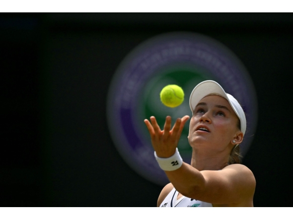 Kazakhstan's Elena Rybakina serves to Belgium's Elise Mertens during their women's singles third round tennis match on the sixth day of the 2026 Wimbledon Championships at The All England Lawn Tennis and Croquet Club in Wimbledon, southwest London, on July 4, 2026. (Photo by Glyn KIRK / AFP) 