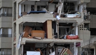 View of a destroyed building in La Guaira, Venezuela on July 4, 2026, following the June 24 twin earthquakes. (Photo by Raul ARBOLEDA / AFP)