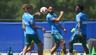 Brazil’s Matheus Cunha (centre) and Vinicius Junior (right) take part in a training session with teammates. (PICS AFP)