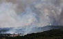 Canadair CL-415 aircraft of France's Civil Security services drop water on a wildfire at the Col des Auzines, near Trevillach, southern France, on July 5, 2026.  (Photo by Matthieu RONDEL / AFP)