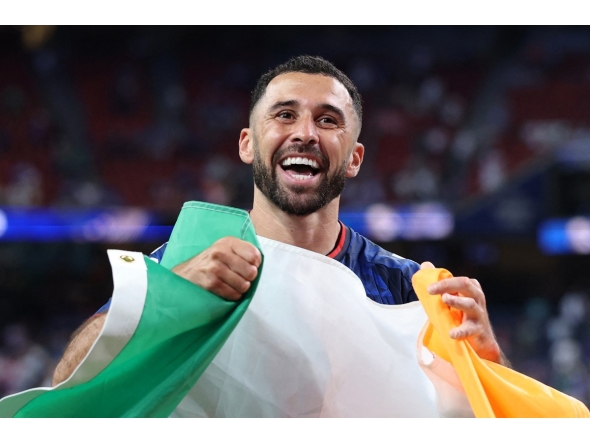 HOUSTON, TEXAS - JUNE 26: Pico Lopes #4 of Cabo Verde celebrates with an Irish flag after the 0-0 draw during the FIFA World Cup 2026 Group H match between Cabo Verde and Saudi Arabia at Houston Stadium on June 26, 2026 in Houston, Texas. Michael Steele/Getty Images/AFP (Photo by MICHAEL STEELE / GETTY IMAGES NORTH AMERICA / Getty Images via AFP)