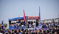 Cape Verde players greet supporters from a bus upon their arrival in Praia, yesterday.