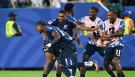 Cape Verde’s players celebrate after Sidney Lopes Cabral scored a goal against Argentina on Friday. 