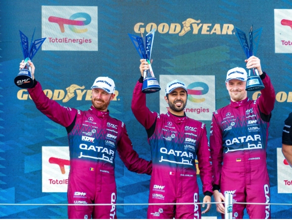 Team Qatar by Iron Lynx drivers Abdulla Al-Khelaifi, Julian Hanses and Maxime Martin celebrate on the podium after securing the second place in the LMGT3 category at the 4 Hours of Imola.