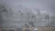 Strong wind brought by Super Typhoon Bavi hits Guam on July 6, 2026. (Photo by Yuichi YAMAZAKI / AFP)