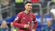 Portugal's forward #07 Cristiano Ronaldo reacts after losing the 2026 World Cup round of 16 football match on July 6, 2026. (Photo by Ronaldo Schemidt / AFP)

