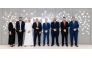 Chief Executive Officer, Qatar, HSBC Bank Middle East Limited, Abdul Hakeem Mostafawi and Chief Executive Officer, Noqoody, Nayef Rashwan pose for a group photo with other officials.