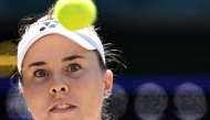 Czech Republic's Linda Noskova stares at the ball before returning to Belgium's Elise Mertens during their women's singles quarter-final tennis match on the tenth day of the 2026 Wimbledon Championships at The All England Lawn Tennis and Croquet Club in Wimbledon, southwest London, on July 8, 2026. (Photo by Kirill KUDRYAVTSEV / AFP)