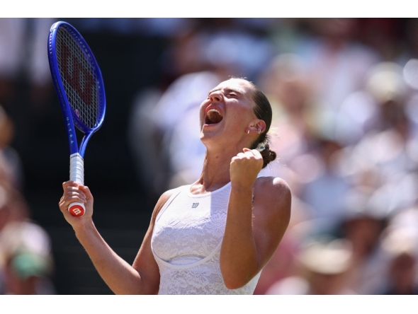 Ukraine's Marta Kostyuk celebrates winning against Italy's Jasmine Paolini during their women's singles quarter-final tennis match on the tenth day of the 2026 Wimbledon Championships at The All England Lawn Tennis and Croquet Club in Wimbledon, southwest London, on July 8, 2026. (Photo by Henry Nicholls / AFP)