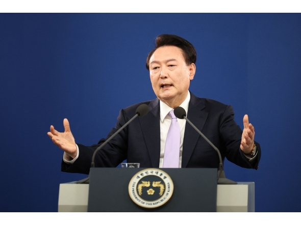 (Files) South Korean President Yoon Suk Yeol answers a reporter's question during a press conference at the Presidential Office in Seoul on November 7, 2024. (Photo by Kim Hong-Ji / Pool / AFP)