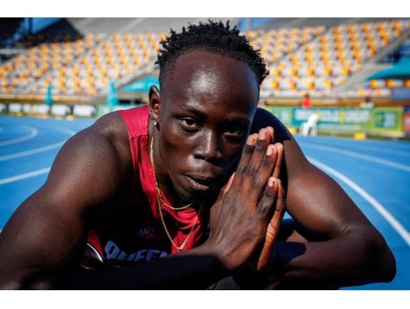 (Files) Gout Gout of Australia celebrates after winning the 100m final of the Australian Athletics Junior Championships at Queensland Sport and Athletics Centre in Brisbane on April 18, 2026. (Photo by Patrick Hamilton / AFP) 