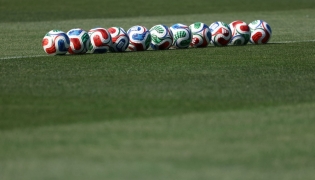 Trionda balls are arranged in a line during a France's MD-1 training session at Bentley University in Waltham, near Boston, on July 8, 2026. (Photo by Franck Fife / AFP)
 