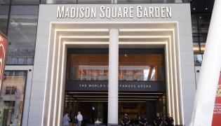 Police officers stand guard outside Madison Square Garden in New York on July 3, 2026. Photo by Leonardo Munoz / AFP