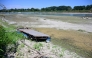 A floating dock for boats is seen lying on the riverbed along the river Po in Castelvetro Piacentino, near Cremona, Northern Italy on July 3, 2026. Photo by PIERO CRUCIATTI / AFP