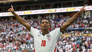 England's midfielder #10 Jude Bellingham celebrates after scoring his team's second goal during the 2026 World Cup football tournament quarter-final match between Norway and England at Miami Stadium in Miami on July 11, 2026. (Photo by ROBERTO SCHMIDT / AFP)
