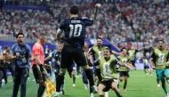 Argentina's forward #10 Lionel Messi celebrates his team's second goal scored by Argentina's forward #22 Lautaro Martinez (out of frame) during the 2026 World Cup football tournament semi-final match between England and Argentina at the Atlanta Stadium in Atlanta on July 15, 2026. (Photo by Thomas COEX / AFP)