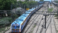 Indian Railways' hydrogen-powered train runs through Haryana's Gohana city on July 17, 2026. (Photo by Arun Sankar / AFP)