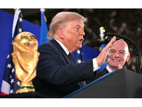 FIFA President Gianni Infantino (R) smiles as US President Donald Trump speaks during a FIFA reception at Trump Tower in New York on July 17, 2026. (Photo by Mandel Ngan / AFP)