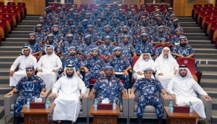 Officials and participants during the ceremony.