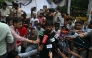 Cockroach Janta Party (CJP) founder Abhijeet Dipke speaks to the media during a protest demanding the resignation of India's Education Minister Dharmendra Pradhan over alleged NEET exam irregularities, in New Delhi on July 21, 2026. (Photo by Arun Sankar / AFP)