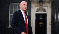 Britain's former Defence secretary John Healey leaves 10 Downing Street in London July 20, 2026 as cabinet appointments are being made after Andy Burnham became Britain's new Prime Minister. (Photo by Henry Nicholls / AFP)