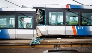 A photograph taken on July 22, 2026 shows the site of an accident involving two trams that collided on the Erasmus Bridge, in Rotterdam, injuring 18 people including two in serious conditions. (Photo by Mitchell de Kwant / ANP / AFP) / Netherlands OUT