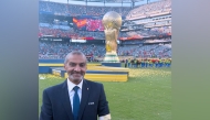 Hani Taleb Ballan poses for a photo at the New York/New Jersey Stadium at the end of the FIFA World Cup final.