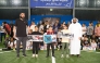  Officials with winners during the ceremony.