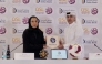  Executive Director of Sales, Marketing and Communication at QSL Hassan Rabiah Al Kuwari and Head of Marketing and Public Relations, Doha Bank, Al Anoud Khalid Al Attiyah during the partnership signing ceremony.
