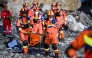 Rescuers work at the site of a landslide in Pengshui Miao and Tujia Autonomous County, southwest China's Chongqing Municipality, July 18, 2026. (Xinhua/Wang Quanchao)