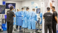 Surgeons and physicians work during the training programme.