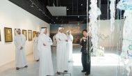 Officials and visitors at the exhibition.