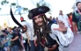 A Jack Sparrow pirate cosplayer poses outside the Convention Center during Comic Con International in San Diego on July 23, 2026. (Photo by Chris Delmas / AFP)