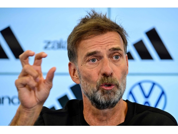 Newly appointed German coach Jurgen Klopp addresses a press conference at the headquarters of the German Football Federation (DFB) in Frankfurt am Main, western Germany on July 24, 2026. (Photo by John MacDougall / AFP)