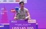 Taiwan's Chou Tien-chen poses on the podium at China Open badminton tournament in Changzhou, eastern China's Jiangsu province on July 26, 2026. (Photo by CN-STR / AFP)