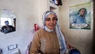Palestinian high-school student Saba Rabah, the top-ranked student in the science stream of the Palestinian national high school exams, reacts at the Maghazi camp on July 26, 2026. (Photo by Eyad Baba / AFP)