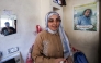 Palestinian high-school student Saba Rabah, the top-ranked student in the science stream of the Palestinian national high school exams, reacts at the Maghazi camp on July 26, 2026. (Photo by Eyad Baba / AFP)