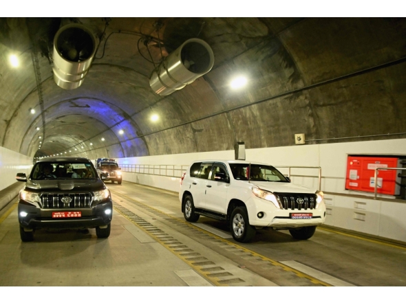 Vehicles ride through the newly inaugurated Nagdhunga tunnel, Nepal's first modern road tunnel, on the outskirts of Kathmandu on July 27, 2026. (Photo by Prakash MATHEMA / AFP)
