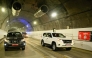 Vehicles ride through the newly inaugurated Nagdhunga tunnel, Nepal's first modern road tunnel, on the outskirts of Kathmandu on July 27, 2026. (Photo by Prakash MATHEMA / AFP)
