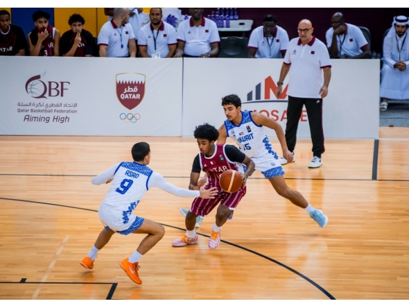 Action during the match between Qatar and Kuwait. 