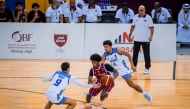 Action during the match between Qatar and Kuwait. 