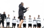 Al Sadd's coach Razvan Lucescu with players during a training session yesterday.