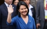 Peru's president-elect Keiko Fujimori waves as she leaves the Foreign Affairs Ministry building for the Congress building after bilateral meetings with heads of state in Lima, on July 28, 2026, ahead of her inauguration. (Photo by Connie FRANCE / AFP)

