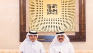 CEO of QIIB Dr. Abdulbasit Ahmad al-Shaibei and Chairman of The Group Securities Hamad bin Khalaf al-Moudadi and during the signing of MoU.