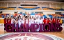 Bahrain players celebrate with their trophy and medals.