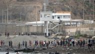 Migrants swim through the waters close to border the with Morocco to enter Spain's north Africa's Ceuta enclave on July 31, 2026. Photo by JORGE GUERRERO / AFP